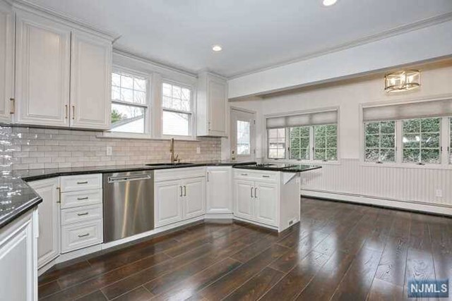 PRISTINE CONDITION! No shoes have touched the floors! High-End Rental. Fully Updated w/Designer Accents Throughout incl; Kitchen w/All NEW SS Appliances, Refinished/New Flooring, Fresh Paint Thruoghout, Beautiful Custom Woodwork & Exquisite Lighting. Sunfilled Spacious Center Hall Colonial Located 3 Minutes to Downtown Westwood where you can Walk to Shops, Restaurants & NYC Transit.Entry Vestibule, Form DR, Living Rm w/Fireplace, Stunning Huge Wood Great Room w/Vaulted Ceiling, Window Seat & Sliders to Patio. NEW Custom Mudroom w/Sliders to Private Garden Oasis-Professionally Landscaped. Upstairs:Primary Bedrm with Dual Closets & Sunny Bonus Room for Home Office/Dressing Room/Gym/or Sitting Room. Two Additional Bedrooms,and Updated Full Bathroom. Full Finish Basement, Laundry, Storage Rm, Cedar Walk-In Closet, Utility Rm. 2 Car Garage/Storage. Gas Baseboard Heat & Central AC. 1 Dog Conditional. DON'T MISS THIS OPPORTUNITY TO LIVE IN A HIGHLY SOUGHT AFTER LOCATION FOR A GREAT PRICE