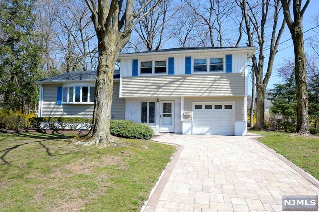 Welcome to this beautifully updated, freshly painted and impeccably maintained Ridgewood Sugar Maple Split. House is an oversized level lot with fabulous paver patio patio overlooking lush backyard and brand new paver driveway. Home features gas fireplace in family room, gleaming hardwood floors, partially finished basement with separate utility/laundry. Snow removal and lawn care will be provided by Landlord.Brand new appliances installed 6/2023