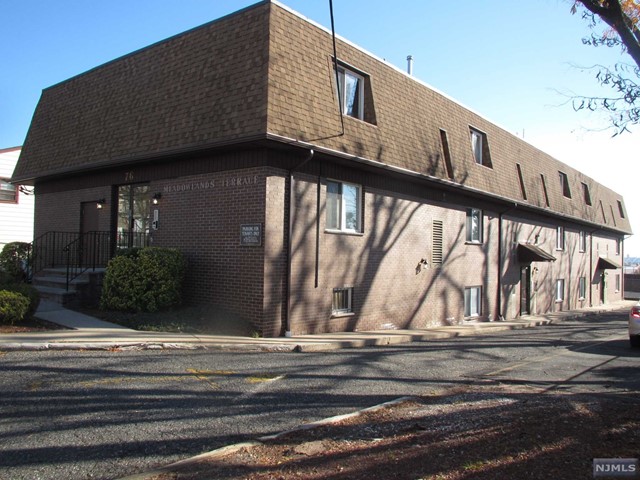 This spacious one bedroom condo is located close to NJ/ NYC Train/ Bus, restaurants and shopping . This unit offers; Large living room/ Dining area combo, large bedroom, walk-in closet, kitchen and full bath . One outdoor assigned parking space, storage bin and coin operated laundry facility in the basement. Hardwood floors throughout. Central A/C. Easy access to all major highways. Commuter's delight.