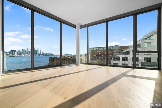 This is the quintessential 2-Bedroom residence with 2.5-Baths and panoramic views of the Hudson River and Manhattan skyline in the iconic NINE ON THE HUDSON. Residence 908 faces south and east boasting floor to ceiling windows, beautiful wood flooring and an absolute to-be-envied state of the art kitchen. Two en-suite bedrooms with exquisite bathrooms. All closets are custom fitted. Custom solar blinds throughout. Incomparable amenities at NINE on the Hudson include Concierge, business center, 2-story gym, sauna, playroom, resident lounge, golf simulator, party room, and the fantastic outdoor courtyard with BBQ patio as well as the beautiful infinity pool. Walk to the Port Imperial Ferry or take the frequent ferry shuttle. Garage parking space and storage locker included in rent! Due at lease signing: 1st month rent, 1.5-month security deposit and a refundable $500 Security Move-in Deposit. Landlord is a licensed NJ real estate broker. No smoking inside the apartment or building.