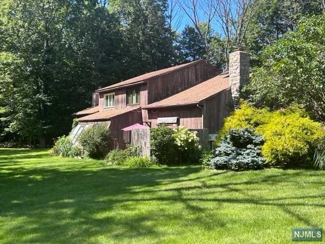 CALL EVE 973-632-4063 1/2 duplex in highly sought after Sparta. Make this yours & enjoy everything Sparta has to offer - top notch schools, great restaurants, charming downtown & beautiful nature! Two levels of living at its finest! Heating is only 2 years old and newer roof. Tons of natural light! Kitchen opens to huge living room with cathedral ceiling and fireplace. Spacious deck and sunroom Featuring 1st floor bedroom with full bath, 2nd floor primary and possibility 3rd bedroom or home office. Home is full of years of collectibles and will be emptied out. Whole house generator. upon contract. Home is as-is including fireplace with no known issues.s.
