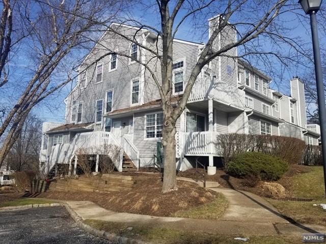 Fabulous 2bed , 2bath with finished basement. Unit is in excellent condition with hardood floors throughout. Beautifully reovated kitchen with granite counter tops, Livingroom with fireplace and Sliding glass doors to eastern facing deck, Master is huge with walk in closet and renovated bath. 2nd bath is also renovated. W/D on main floor. Downstairs is a fullly finished basement with huge family room and a separate space perfect for multi uses. This unit has very few stairs to front door. Plenty of parking right out front. Complex has pool and tennis plus picnic area. Located close to Houses of Worship, All major highways and local conveniences. No dogs are allowed in complex