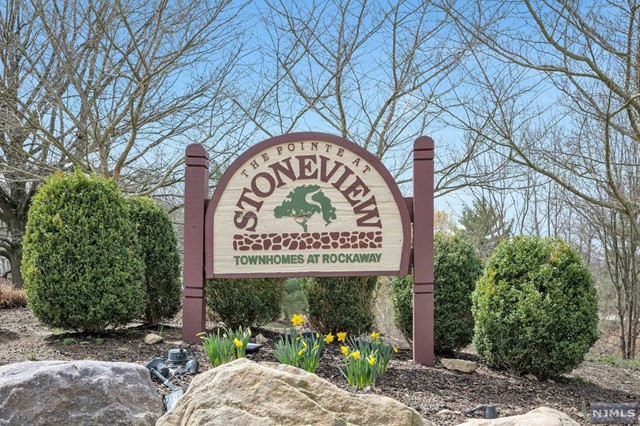 Welcome to this beautifully updated, partially furnished 3 bedroom, 2.5 bath townhouse. First floor features: an updated kitchen with stainless appliances, a cozy family room with fireplace and sliders to a private patio. The combination living/dining room is great for entertaining. The second floor offers: a primary king size bedroom with a walk-in closet and an updated full bath. There are 2 additional bedrooms and another updated full bath. Laundry is conveniently located on the second floor and includes a washer/dryer. Enjoy the beautiful pool which is in walking distance. This townhouse is located close to shopping, transportation (NYC), Rockaway Mall, and steps to Peterson Field.