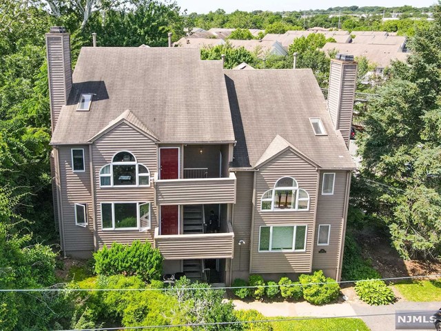 Just renovated 2 story townhome featuring 2 beds, 2 baths, & 2 designated parking spaces! Nearly 1,800 Sf and conveniently located 15 mins from NYC this completely gut renovated spares no expense. Brand new kitchen, bathrooms, floors, wic built-ins, mechanicals, balcony, & patio. Large bonus room can be used as family, office, or den. Stunning finishes throughout, nothing to do except unpack! Taxes only $6871 and maintenance fee $300!!!
