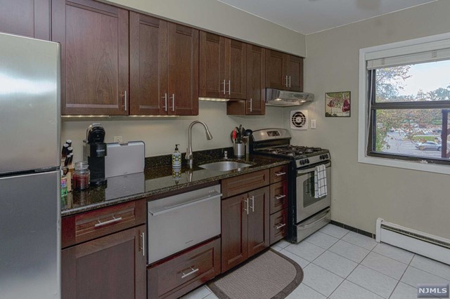Very Large and Spacious Renovated Apartment is ready to be Your New Home! Recently Updated and Tastefully Done Kitchen and Bath has what you need for modern living. Spacious Eat-in Kitchen with Custom Soft-Close Cabinets, Granite Counters and Stainless Steel Appliances. Large Living Area with enough room for a Home Office or Formal Dining Space. Hardwood Flooring throughout and Tons of Natural Light beaming in! Plenty of Storage available both in basement and attic! Easily Accessible to major highways. Investors welcome, can immediately rent out! Pets conditional.