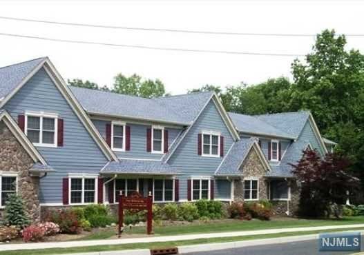 Updated 2nd floor apartment (905 sq. ft) with open floor plan. Light and bright living room and dining area, pendant lights over granite counter tops, crown molding and hardwood floors - all this with a contemporary flair. W/D in unit and onsite parking. Basement storage as well as a security system. Conveniently located near everything!