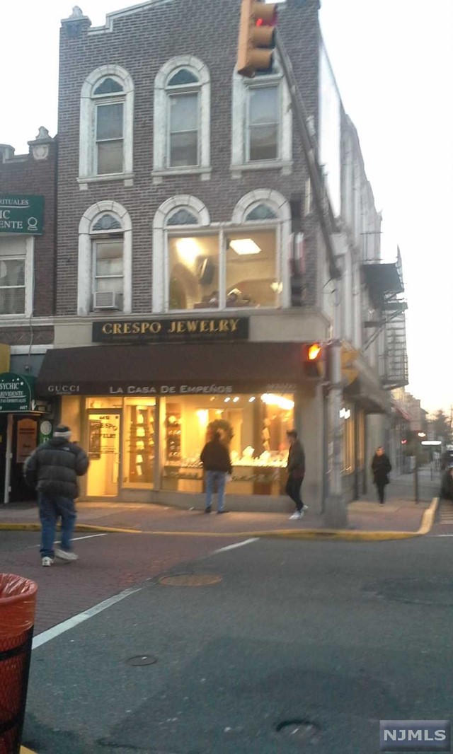 Right in the heart of Union City, corner store plus 3 residential units, plus beauty parlor 2nd floor plus first store on Bergenline Ave. Owner will finance to qualifying buyer Great Opportunity.