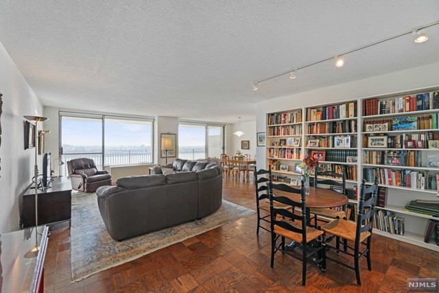 Large 2 bedroom with 2.5 baths, and full river and Manhattan views from the 53 foot terrace. New redesigned kitchen with stainless steel appliances. Bosch washer and dryer. Hardwood floors. All the bathrooms have been renovated. Amenities include: State of the Art fitness center with indoor and outdoor pools, movie theater, social room, library, card room, children's playroom and outdoor play area, mens and ladies locker rooms with sauna, and more.