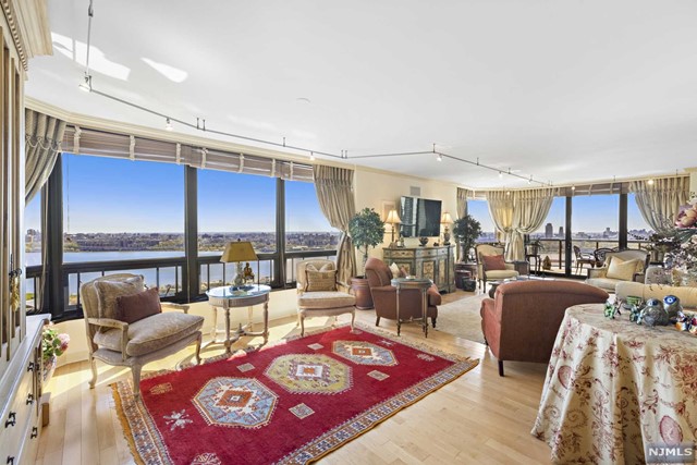 Camelot in the sky w/ 3,400 SQFT, including 260 SQFT of terraces, home w/ magnificent views that span from the George Washington Bridge to the entire Manhattan Skyline & Hudson River from EVERY room in the Royal Buckingham. Renovated home boasts of the highest quality finishes throughout. This 3 BR/ 3.5 BA home has all of the space that you deserve, including ample closet space throughout, and complemented with exquisite hardwood floors throughout, custom molding for your designing convenience, gourmet eat-in kitchen, expansive separate dining room, massive living room w/ panoramic views, and two balconies. The Royal Buckingham is a luxurious full amenities residence w/ 24 hr concierge, lobby, playroom, a library/ office for your convenience, an Event room, exercise room, and last but not least an outdoor pool w/ the most amazing views of NYC!