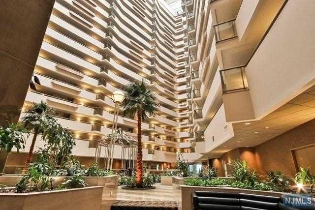 Atrium Palace 2 bed,2.5 bth 1638 sq ft unit, w/d in unit ,full service Luxury building with indoor and outdoor pool, tennis courts, health club ,close to shopping, NYC transportation