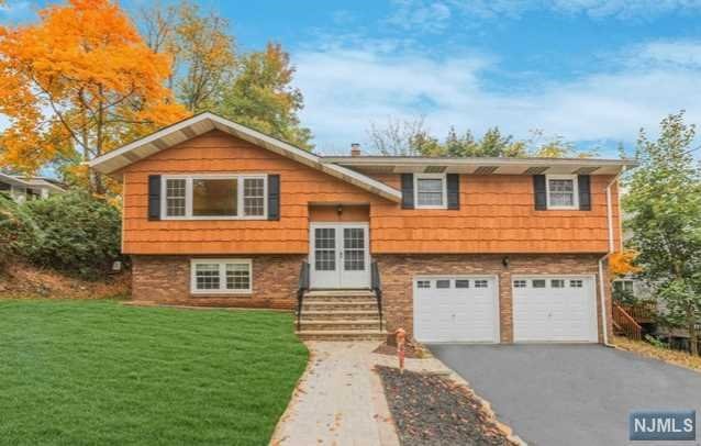 Fully renovated single family over 2,300 sqft of living space offering 4 bedrooms 2 and half bath. Walking in the first floor to a spacious family room with fire place one bedroom and half bath and 2 car garage. walking up to the second floor to an open concept between the living room dining room and kitchen as well 3 bedrooms and 2 full bath with master and walk-in closet. Beautiful deck right of the kitchen over looking you own spacious backyard for all your family gatherings.