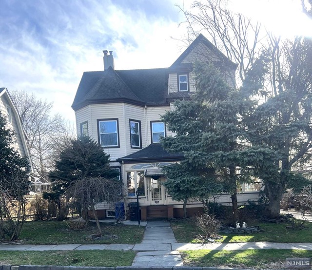 Located on one of Rutherford's most desirable tree-lined streets. This charming spacious unit has been freshly painted, new flooring and windows installed and both kitchen and bath have been updated. Tenant will have sole use of the attic offering tons of storage. Heat and water are included in the rent! Conveniently located near major highways routes 3, 17, 21, GSP and NJ Turnpike. Near transportation to NYC. NO pets and no smoking of any kind permitted. Truly a must see apartment.