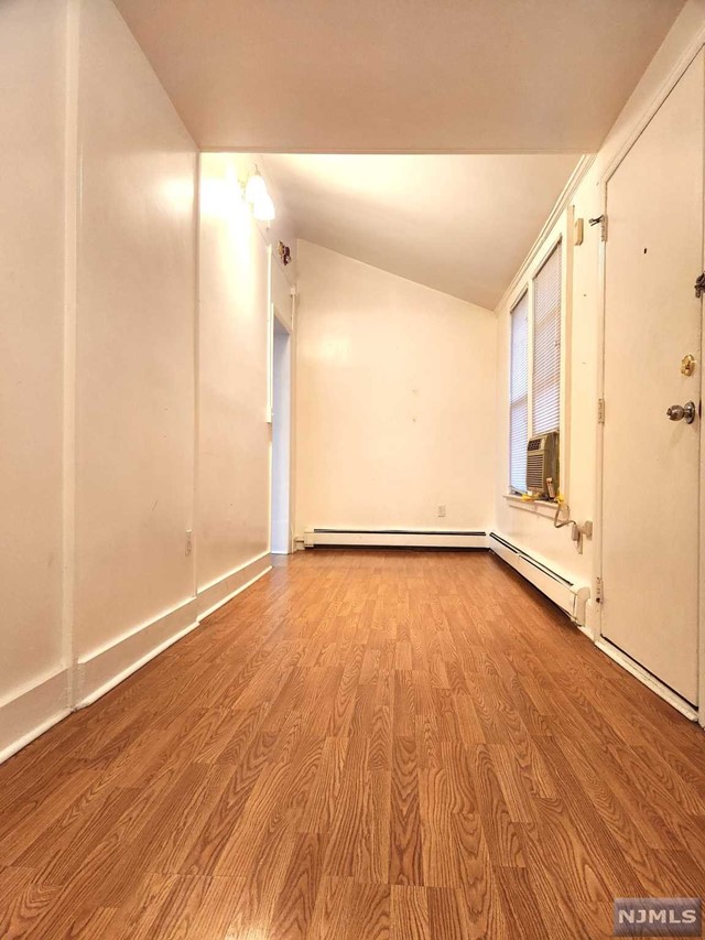 This apt was renovated within the past few years, boasting clean and airy vibe. This apartment home is perfectly situated in close proximity to shops, NYC transportation, restaurants, and so much more! This is where convenience meets comfort! Walk in to the living room, which leads to the primary suite with a private bathroom. Good size bedroom with ample closet spaces (1 walk in & 1 reach in closet). The eat-in kitchen offers space for a dinning table to enjoy your meal. Living room is narrow and long for a creative touch. 1 parking is included right in front of the unit.