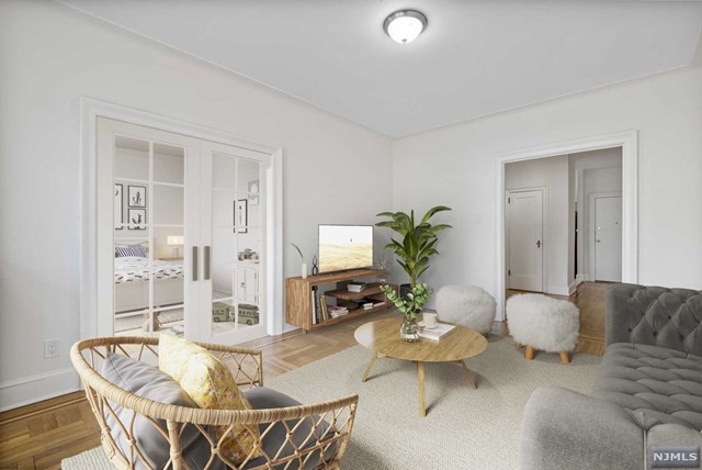 Check out this completely renovated and restored spacious two bedroom co-op unit in an amazing location only steps to NYC transportation (20 mins to Midtown NYC) with every convenience outside your front door. The entry foyer opens into a large living room perfect for entertaining. Off of the living room is the second bedroom (French doors can be added per your request) but just in case the owner has left it flexible to be used as a formal dining room, large office or den. Freshly painted, refinished floors, king-sized bedroom, brand new kitchen and bath plus updated electric. On-site super, laundry room are included in maintenance along with property taxes, heat, hot/cold water/sewer, care of common spaces, trash disposal and snow shoveling. Parking is easy and free with a Weehawken resident sticker at the supermarket plaza right next door. This one has everything at a truly affordable price. Building has strict no pet policy. *Some images are virtually staged*
