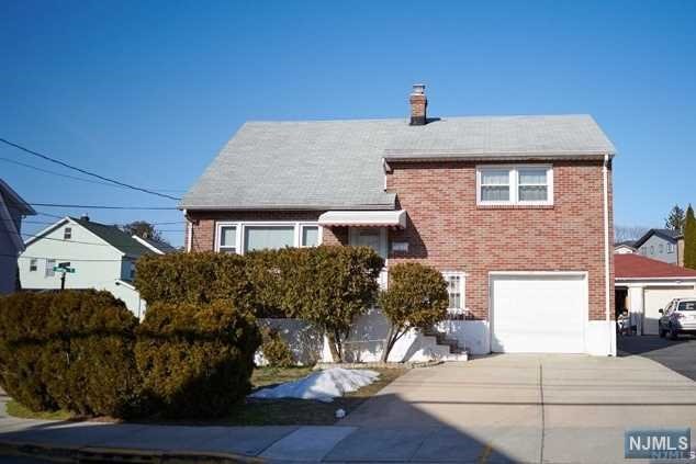 Welcome to this large S/L Single Family house on the quiet street. Very bright living room. All Hardwood Floor throughout. Central AC, Two Driveway parking and the fenced patio & yard offers plenty of room to play and entertain. NYC Transportation is step away. Garage and basement is excluded.