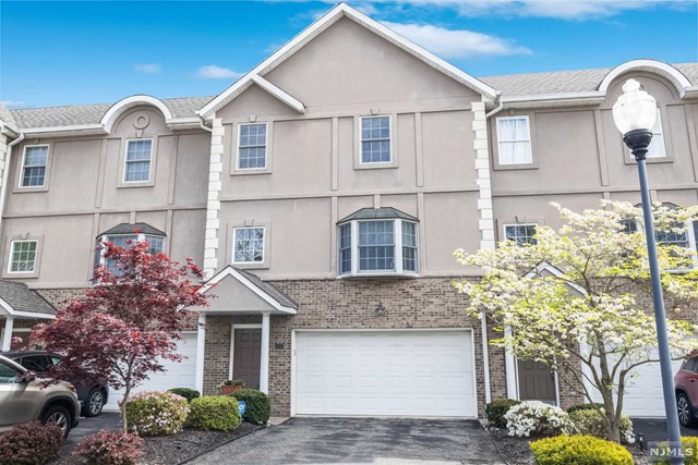 TOWNHOMES AT OLDE WOODS!! SPACIOUS AND TURN KEY 3 BEDROOM, 3.5 BATH CUSTOM LUXURY TOWNHOUSE. APPROX 2600 SQ.FT WITHOUT THE FINISHED BASEMENT. CENTRALLY LOCATED ON A CUL-DE-SAC STREET. GROUND FLOOR ENTRY INTO THE 2 STORY FOYER, OVER SIZE 2 CAR ATTACHED GARAGE. FINISHED RECREATION RM WITH A FULL BATH/SS, LAUNDRY AREA AND STORAGE. THE FIRST FLOOR OFFERS AN OPEN FLOOR PLAN WITH A LIVING RM/DINING RM COMBO, POWDER RM, MODERN KITCHEN WITH CHERRY CABINETS, GRANITE COUNTER TOPS AND STAINLESS STEEL UPDATED APPLIANCES, BREAKFAST ARE WITH DOORS LEADING ONTO A PRIVATE REAR DECK, FAMILY RM WITH A GAS FIREPLACE. THE 2ND.FLOOR OFFERS A SPACIOUS PRIMARY BEDROOM WITH HIS & HER CLOSETS, LUXURY BATH WITH SEPARATE SHOWER STALL & TUB. 2 MORE LARGE BEDROOMS AND A HALLWAY FULL BATH/SOT. THIS IMMACULATE UNIT IS READY FOR OCCUPANCY. PLENTY OF CLOSET SPACE & EXTRA STORAGE SPACE, CLOSE TO SCHOOLS, SHOPPING & PUBLIC TRANSPORTATION. A MUST SEE!!