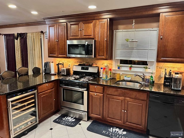 Nicely renovated and well kept house. Great schools, Elementary, Middle & High school on walking distance Garage with Gym equipment+TV Kitchen with TV Cherry Cabinets & Granite countertops & Backsplash Fenced backyard. Porch & shed for storage New paved Driveway for 4 cars & Paved rear Patio. Laundry & Kitchen appliances & Water Heater like New. Central Air wine cooler