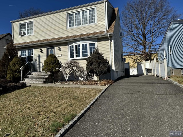 Welcome to this 2 bed/1 bath first floor rental with use of Backyard & driveway. Featuring hardwood floors, open concept living room, modern eat in kitchen with dishwasher & new refrigerator included. Two large bedrooms with plenty of closet space and a nicely updated Full Bath. This lovely home has been freshly painted and ready for you to enjoy all that this home has to offer from the fenced in lovely backyard, parking in driveway for multiple vehicles and washer/dryer in basement with additional storage, storage shed included for tenant use. Window AC provided and patio furniture included. Wired for Fios or Optimum.