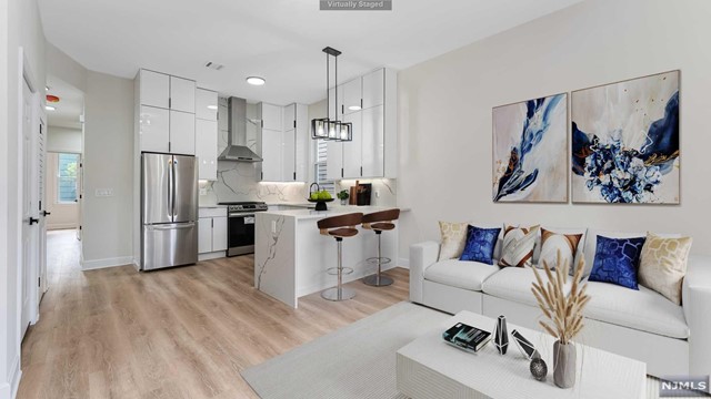 Completely renovated 2 Family on Summit Ave in Union City! Unit 1 & Unit 2 both still currently available for immediate occupancy. Each unit features 3 bedrooms, 1 bathroom. Extremely high-end & luxurious finishes! Laundry in each unit for your convenience. Gorgeous open-concept layouts with designer kitchens - quartz countertops & backsplashes, stainless steel appliances, and beautiful tall white modern cabinetry. Very spacious floor plan with high ceilings. Central Air is an added bonus. EVERYTHING is brand new! Sorry, no pets. Street Parking. 1 month broker fee required. Utilities are separate. Tenant responsible for snow removal. Proof of Income & Credit Check Required. STEPS away from transportation into NYC!