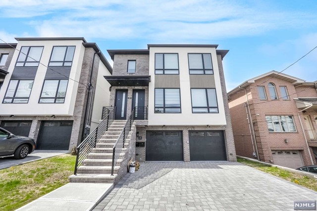 Brand new! 1ST FLOOR OF 2 Family home . Open layout, Custom kitchen with stainless steel appliances, Quartz Countertops, Trex Decks and custom blinds. Master suite, 2 additional bedrooms. Lots of Custom Closet Organizers . Custom woodwork, Solid oak hardwood floors, Radiant heat Porcelain floor on all bathrooms and entire ground level. Navien High efficiency, High output, High performance Boiler and many more features. Close to major highways and NYC transportation.WALKING DISTANCE TO NYC BUS STOP.
