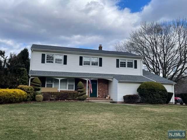 Lovely Colonial. Quiet street. Private yard. Covered front porch. Living Room. Dining Room. Mod. eat in kitchen with door to deck/yard. .5 bath/laundry. Family Room with fireplace. Access to 2 car att. garage. 2nd floor: Primary bedroom with WIC & new shower stall bath. 3 more bedrooms. Full bathroom. Unfinished storage basement. C/A/C. Inground heated pool.(Tenant to maintain pool).2 car attached garage. Close to shops/parks & NYC buses. Tenant responsible for pool, lawn, snow, utils. and garbage. Tenant required to have insurance. No Pets.