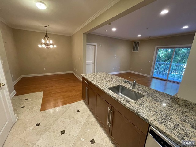 Tastefully renovated and well maintained spacious unit, boasting updated floors and finishes. Granite counter tops, stainless steel appliances, Large Custom closets, patio with golf course views and more! Garage parking spot included plus plenty of visitor parking. In unit washer/dryer. Community room and well equipped exercise room. Located off of route 4 east for easy commute to NYC, shopping, major highways, etc.