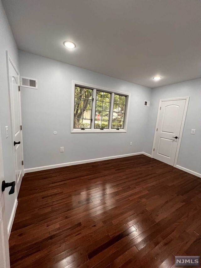 This three-bedrooms apartment has been completely renovated, offering a modern and comfortable living space. The newly updated kitchen features sleek cabinetry, granite countertops, and stainless-steel appliances, providing both style and functionality. The two bathrooms has been fully remodeled with contemporary fixtures, elegant tiling. throughout the apartment, you'll find beautiful hardwood floors that add warmth and sophistication, complemented by fresh, neutral paint that brightens every room. With central air conditioning, the space stays comfortable year-round. This apartment blends modern convenience with classic design elements, making it a perfect place to call home