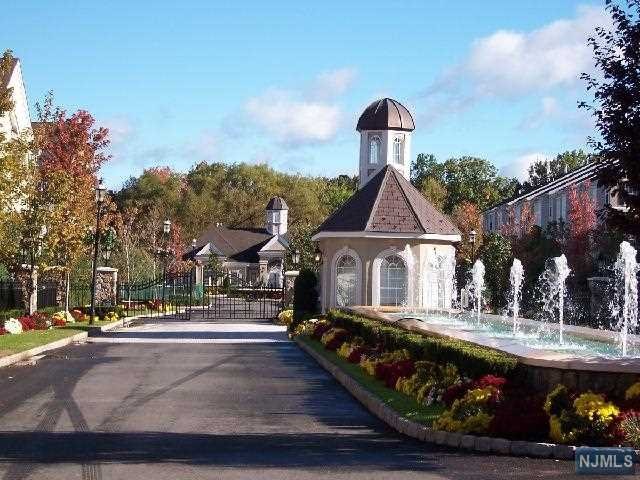 Welcome to A Luxurious Townhouse Located in the Sought After Gated Community of Cambridge Crossings. This Beautifully Move in Conditions Unit Provides you with The Sought After Loft/Open Floor Plan. The Main level Features a Spacious Living Room, Dining Room, Gas Fireplace, Kitchen w/ New Stainless-Steel Appliances, Laundry Room, Powder Room, Master Bedroom w/ Master Bathroom, A Walk-In Closet, A Large Second Bedroom & Direct Access to Your Attached Garage. The Master Bathroom comes with Double Sink, Soaking Tub and Enclosed Stall Shower. You will Enjoy the Sought-After Loft Space Which Is Ideal for Work from Home or Home Office with A Large & Convenient Storage Area. It's Balcony View is Amazing. Cambridge Crossings Features, 24 Hrs Security Booth, In-ground pool, clubhouse and exercise Rm. Cambridge Crossings' Recent Upgrades & Perfect Location enjoys proximity to NYC Bus/Train, Highways, Shopping, Schools, Houses of Worship. Come and Make this Stunning Unit Yours.