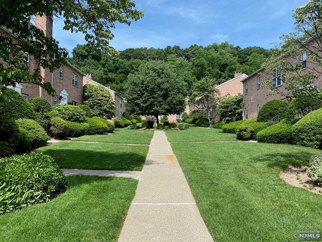 Located in beautifully landscaped Winthrop Manor, this apartment features 2 bedrooms and 1 Bath. The spacious living space includes kitchen, dining room and living room with crown molding. Central air & heat, with hardwood floors throughout. Abundant closet space in bedrooms, and within unit. Winthrop Manor is located on N. Maple Avenue and is close to both the Ridgewood & Hohokus downtown areas. Just blocks from Hohokus train station, commuting is a breeze. Additional conveniences include a 1 Car attached garage with indoor access to building, as well as ample outdoor parking (spots are on a first come, first served basis). Extra storage space located in basement, as well as shared laundry. Property manager on-site. Cold water included. Tenant pays all other utilities (gas, electric, cable/internet). Pet Friendly (Max. 50lb, additional pet fee/month) and non-smoking. Stairs throughout complex. (Photos of similar unit.)