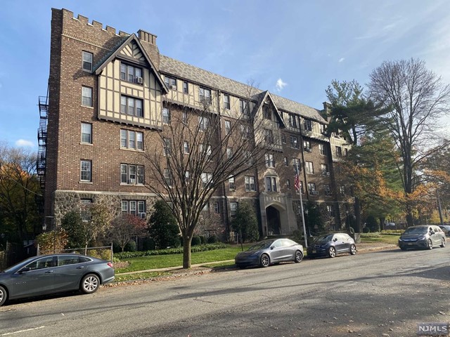 Englewood East Hill apartment in charming Tudor Hall complex situated right opposite Englewood Hospital. Hardwood floors, granite countertop. Large Private Storage Room included with the sale. Interior Courtyard with a fountain, plantings and benches for your summertime pleasure. If you like old world charm this beautifully detailed building is the home for you. Bus stop to NYC in front of complex, close to shopping, restaurants and the Bergen PAC. Smoke Free Building.