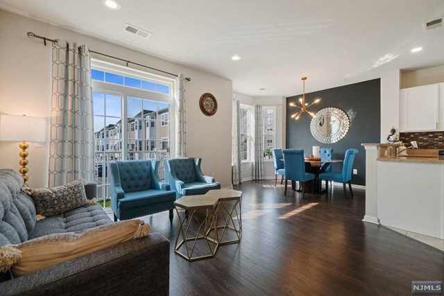 Available for move-in from June 15th. With just under 1800sq/ft, this luxury Davenport model townhome offers 3 BR / 2.5 baths & open concept layout offering natural sunlight w/ kids parks & athletic sport field at walking distance. 1st fl features living room, modern kitchen w/ custom cabinets, pantry, energy efficient SS appliances, dining with premium chandelier and huge bay windows, half bath & patio. 2nd Floor features super spacious master bedroom with high cathedral ceilings & large windows, huge Master closet and master bath, 2nd bed with walk-in closet, Bedroom #3 and laundry room. The desirable Liberty Square at Wesmont Station community features NJ Transit train station & bus stops for easy commute to NYC, Coffee & Liquor store, Athletics Sports Complex, dog park and much more.