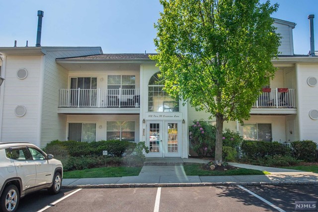 Spacious first-floor end unit condo in highly sought-after Season Glen community. No stairs! Completely renovated 2 bedroom, 2 bathroom featuring a large walk-in closet and ensuite in the main bedroom, private balcony overlooking gorgeous greenery, den/office & more. Open, bright living space! Functional galley kitchen w/separate dining. Close proximity to all amenities including a pool. tennis courts, clubhouse, exercise room, and playground. Quick and easy access to NJ Transit Train & Bus Station and major highways; 80, 46, 10. Move in Ready. Freshly painted, new flooring and carpeting. Stainless steel appliances including refrigerator, range/oven-gas, microwave, and dishwasher. Stackable washer/dryer combo. Great community! Landlord prefers no pets.