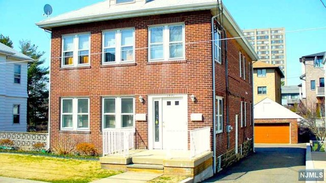 Rare to find 2 family house 1st floor w/basement!!Quiet residential street!Facing east & lots of windows very bright!Small 2 bed rooms unit & beige color carpet throughout!Shared entrance foyer to french door(left side) w/hallway!Enclosed porch w/6 windows!big living rm & dining rm w/ceiling fan!Renovated kitchen w/white stove & refrig!1st bed rm w/ceilng fan!2nd bed rm access to backyard!Huge full finished basement w/4 windows!Storage rm for extra space!Utility rm w/electric washer & dryer!All utilities are included except gas & electricity(electric washer & dryer)!Landlord will take care the lawn but tenant is responsible for snow removal!Landlord will keep tools in garage so do not block driveway but 1 outdoor parking space behind the house is included!Convinient location for ny trans & school & shop!