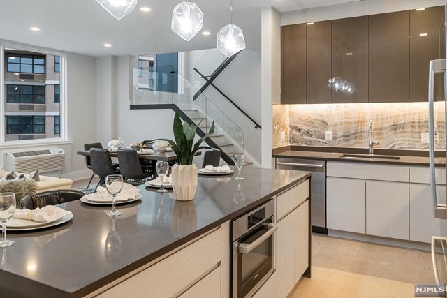 Stunning, brand new construction ultra-luxury rental building on River Road in North Bergen. Absolutely gorgeous finishes and features with tons of amenities. Amazing Pool & Pool Deck with fire pit and grills with unobstructed NYC views. On-site gym, doorman, and garage parking available. Units currently available: 1 bed / 1 bath layout; 2 bed / 2 bath layout; and duplex-style 2 bed / 3 bath layout. State of the art kitchens boast Bosch appliances, sleek European-style cabinetry, under-cabinet lighting, waterfall quartz countertops, and center islands. Bathrooms offer imported porcelain tiles, Grohe trim package, and floating vanities. 7-inch hardwood flooring throughout. Laundry in unit. Storage available. Amazing location so close to transportation into NYC... Ferry & Bus! Close proximity to fabulous restaurants, shopping, Hoboken, and more. Pet may be considered. 1 month FREE on 18 month lease. Credit Check & Proof of income required.