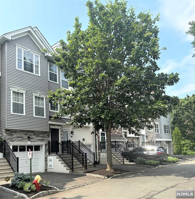 Welcome to this warm & inviting, 2 bedrm, 3.5 bath, townhome with 3 floors of easy living! Privacy abounds in this prime location close to pool & clubhouse. Upon entering the 2-story foyer you feel at home.The 1st flr has an open floor plan & boasts a LR, powder rm, Kit. with light oak cabinetry which is adjacent to the FDR with a door to a private deck.The 2nd floor features a large MBR suite with a vaulted ceiling,a private spa Style MBA with a double vanity,soaking tub & a separate shower + 2 closets (1 walk-in).There is 2nd bdrm with a vaulted ceiling, a FBA + a laundry rm complete this level.The finished, walk out,LL features a FBA, a family rm with a gas FPL for extended entertaining or home office. Recent updates inc: new roof & gutters (6/23),Gas HWH (2018), Front door & stoop ('21). Relax & enjoy all the amenities, pool,clubhouse & conveniences that this gated community has to offer.Close to Hwys,NYC bus & train. Make this your new home this Summer!