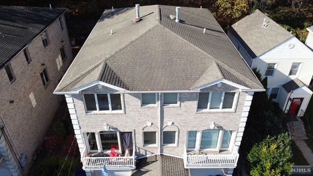 *Available August 1* Here's your chance to live on one of Edgewater's most desirable streets. Moments to both downtown Edgewater and Fort Lee where you'll find countless amenities, restaurants, and activities to enjoy with the family. Plenty of space to work from home, Take a ride through the cliffs overlooking the Hudson, or Have a picnic with the family in the Ross Dock Picnic Area. Spacious Living Area and Open Stainless Steel Kitchen with a Unique outdoor balcony at the front of the home and also sliding doors that lead to a private stone patio in the backyard. Decorative Inlays and Recessed Lighting throughout. Opulent Master Bedroom with private Ensuite Bathroom with nicely sized bedrooms and Full Bathroom. Endless options with the ground floor Family Room and Bathroom for a dedicated office or a theater/playroom with a private side entrance.