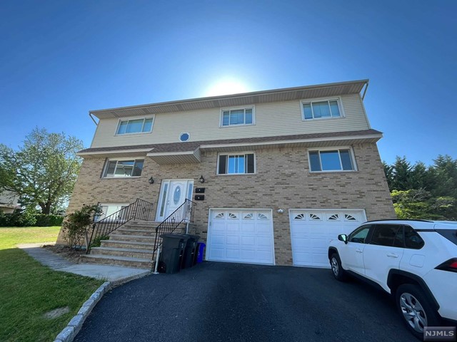 Large second floor unit in top and bottom 2-Family house on a Cul-de-Sac street. Offering 3 bedrooms, 2 full bathrooms, living room, formal dining room, eat-in kitchen, large attic for storage. One car Driveway, garage and on street parking available. Laundry hook ups on ground floor. Backyard use available. Convenient to schools, shopping and highways. Cats ok, small dogs ok. Large walk out basement is also available with additional amount. Wall A/C on each room. Full credit report (not score only) for all adults and last 2 months income verification required. House not on Flood Zone