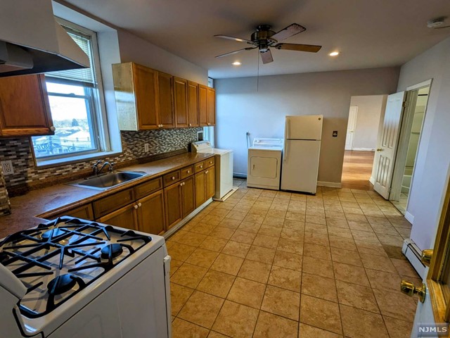 Fantastic chance to lease a renovated 3-bedroom, 1-bathroom home conveniently situated near all amenities! This upper-level unit boasts a roomy eat-in kitchen, an in-unit washer and dryer, a generously sized full bathroom with a modern vanity, three good-sized bedrooms, and recently upgraded hardwood floors. Two designated off-street parking spots enhance the overall value. With its immediate availability, this property offers very close proximity to mass transit, restaurants, stores, schools, and major highways.