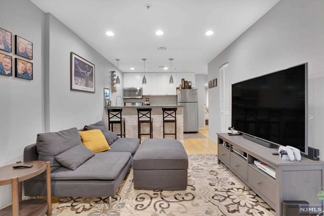 With everything you could possibly need and more, this lovely apartment is conveniently located between Palisade and Bergenline. The apartment has a one bedroom, one bathroom, washer/dryer inside the unit, a private balcony, covered parking, and is close to transportation to New York City. With low HOA & Taxes this is a great investment for both investors and residents alike. This recently renovated home is in pristine condition with a brand new HVAC system. Come and see it for yourself!