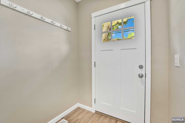 This stunning, fully renovated first floor unit is centrally located in downtown Butler, just minutes from Rts 23 and 287. Featuring 2 entrances, central air, laundry in unit, and private parking, this spacious apartment also boasts a new kitchen with an oversize pantry, granite countertops, and stainless steel appliances. It also features beautiful exposed brick chimneys and a master bedroom with plenty of storage space throughout. Carefully renovated and beautifully maintained, this sunny unit is the perfect opportunity to be located close to shopping, transportation, restaurants, and parks!