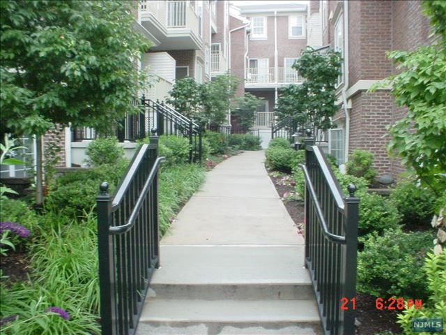 13-year young townhome on 2nd & 3rd floors. Gettysburg model with 1225 SF. 1 Covered parking space plus a Garage. Refrigerator, Dishwasher, Trash Compactor, Washer, Dryer & Microwave included. LR: 15x14, DR: 10X12, Kitchen: 10x10'8, BRS: 14'10X12 & 14'6X15'8. Central Air. Wall-to-wall carpet throughout. 9' ceiling on lower level. 1.5 month security deposit. Close to Path Station, Rt. 280, Rt. 21, Turnpike, Parkway, NJPAC, Prudential Center, Red Bull Stadium, NJIT, Rutgers, etc. Gym, Swimming pool & clubhouse usage included. Flood insurance covered by condo HOA fees. Available to occupy on July 1st. No pets, no loud music & no smoking in apartment. Tenant to pay $150 move-in fee & 200 refundable moving deposit required by the condo management. 1.5 month security deposit. One-month Broker's commission to be split between the landlord and the tenant. Each pays a half. Attached photos taken a year ago.