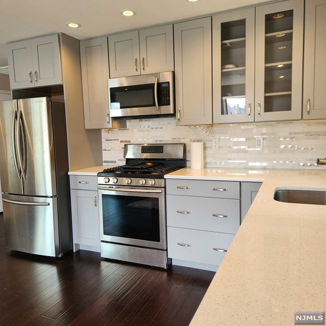 This spacious one-bedroom apartment is located on the second floor. The unit features a modern-style kitchen with stainless steel appliances, hardwood floors, a large hallway closet, central AC, and an in-unit washer and dryer. The bedroom boasts two generous closets. Additionally, there is a parking spot available, and the apartment offers a convenient location within walking distance of an NYC bus stop. It's worth noting that consideration may be given to allowing one small pet on a case-by-case basis. If you have any further questions or require additional information, please feel free to ask!