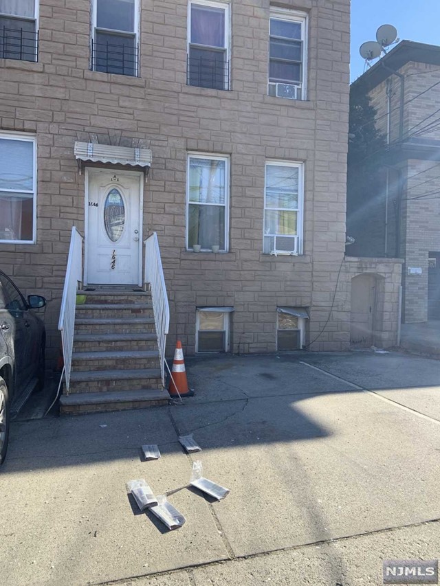 All hardwood floors thru out.. One bedroom is very small. 1 parking is included NY Bus is around the corner, and many shops