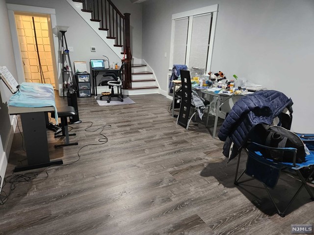 Older dup style, newer hardwood floor thru out, up dated kitchen & bath rooms. All tiled basement for laundry, one car garage parking, excellent location to commute to NYC.