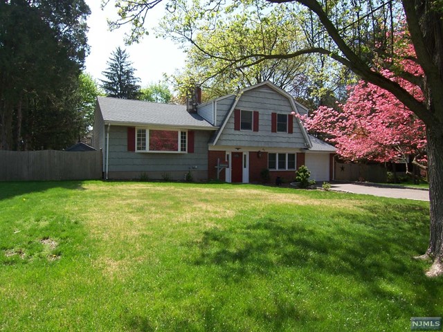 Updated S/M/S in great area, close to downtown, transportation & schools on nearly 1/2-acre property. Tiled entry leads to tiled family room (currently used as FDR) W/SGD to patio plus den & full bath, overlooking private fenced rear yard with gazebo & 2 storage sheds. Living room has floor to ceiling brick FPLC, Updated kitchen features vaulted ceiling, GE SS appliances, dining area & SGD to screened-in porch. Primary BR with full bath, main bath with whirlpool tub. Refinished hardwood floors or tile throughout, central Vac, C/A & Washer/Dryer. Tenant pays first $200 of each repair defined as one which cost less than $400 after the first 30 days. Must carry tenant insurance & responsible for all utilities, landscaping including leaf removal & snow removal. Photos are from when both vacant and current occupant.