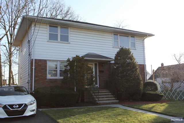 Discover this lovely 3 bedroom second floor apartment available in Elmwood Park. This unit offers a spacious living room w/ tons of natural light, hardwood floors, a large updated bathroom with a granite vanity and double sinks, an eat-in kitchen w/ dishwasher, and basement laundry. All utilities responsibility of tenant. Landlord pays for water. Tenant responsible for Realtor Fee equal to 1 months rent as well as 1.5 months security deposit. Clean credit, proof of income, and interview required. No use of yard. NO PETS No Smoking