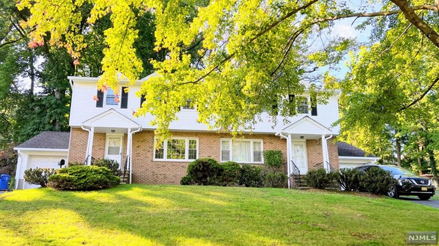 Updated 3 br, 2.5 bath duplex on the cul-de-sac street. Entry foyer w/closet, PR, spacious LR, FDR, MEIK, FR w/ slider to the patio. 2 BR, 1 fbath plus the Master BR w/shower. Finished basement with Rec rm. Hardwood floors throughout.