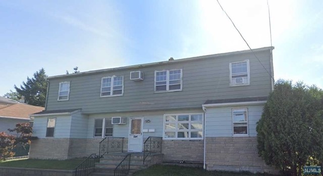 Step into this inviting and spacious 2-bedroom apartment, nestled on the second floor of a charming two-family home in North Arlington, NJ. Abundant natural light floods the space, creating a warm and welcoming atmosphere. Recently refreshed with a new coat of paint and professional cleaning, this apartment is ready for you to call it home. The layout comprises a generous living and dining area, a well-appointed eat-in kitchen featuring a refrigerator and gas stove, and a full bath. Two sizable bedrooms offer ample closet space, with hardwood flooring enhancing the entire living space. Earliest availability starts on February 1st. Tenants are responsible for gas and electric. Street parking is plentiful! This apartment has a washer and dryer in the unit!