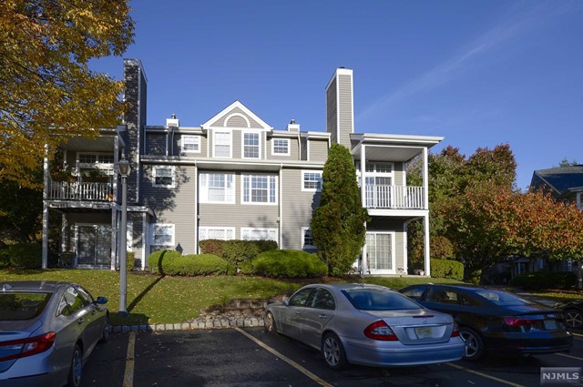 Main floor features spacious, bright dining/living area with vaulted ceiling and fireplace, newer kitchen, private deck, large bedroom with walk-in closet, full bath and laundry. Second floor features spacious private bedroom with walk-in closet and full bath. Sought after Paddington Square Community offers Pool, Clubhouse and Playground. Close to NYC Transportation. Pet conditional. NO SMOKING. Tenant insurance, credit check and lease application required. 1 assigned park spot in front of unit. Plenty of visitor parking in the complex.