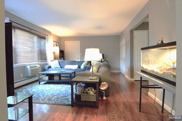 Bright and spacious, one bedroom condo on the first floor in Ridgemont Gardens. Modern kitchen, dining area and a large living room. Hardwood floors throughout and plenty of closet space. Conveniently located near shopping, restaurants and major highways. Two assigned parking spaces. Heat and hot water included. Laundry and storage in basement. No pets